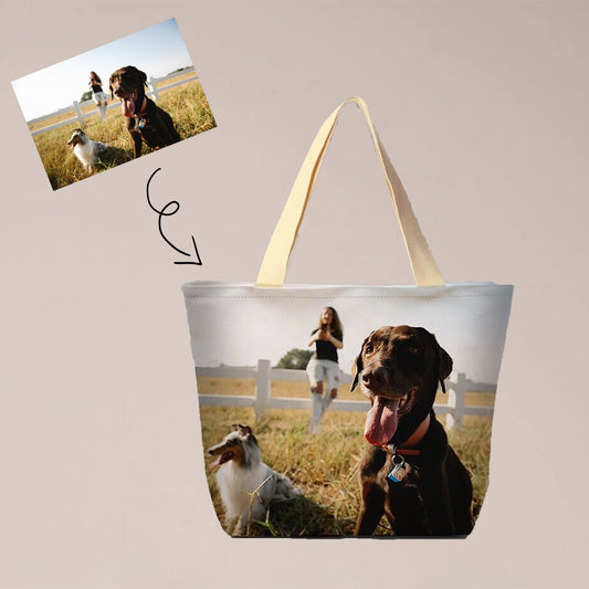 A all over print custom tote bag with a photo of a woman and two dogs is a thoughtful and unique gift. The bag is large and the photo is vibrant, making it a conversation starter.